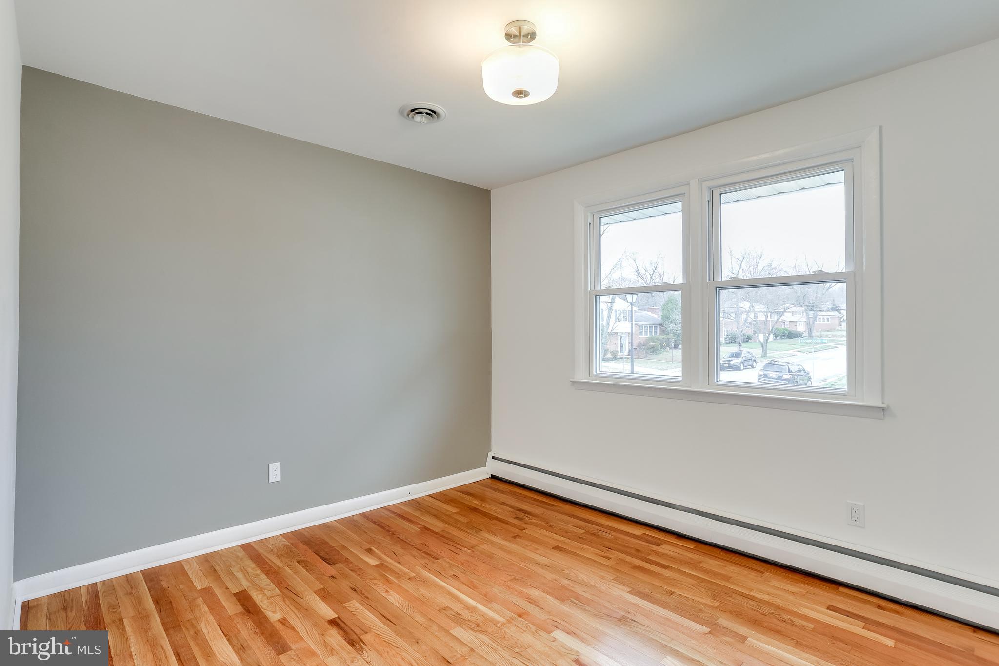 221 Coldbrook Road Lutherville-Timonium, MD 21093 - Photo 16 of 37 Bedroom #2 w/ Those Gistening Hardwood floors