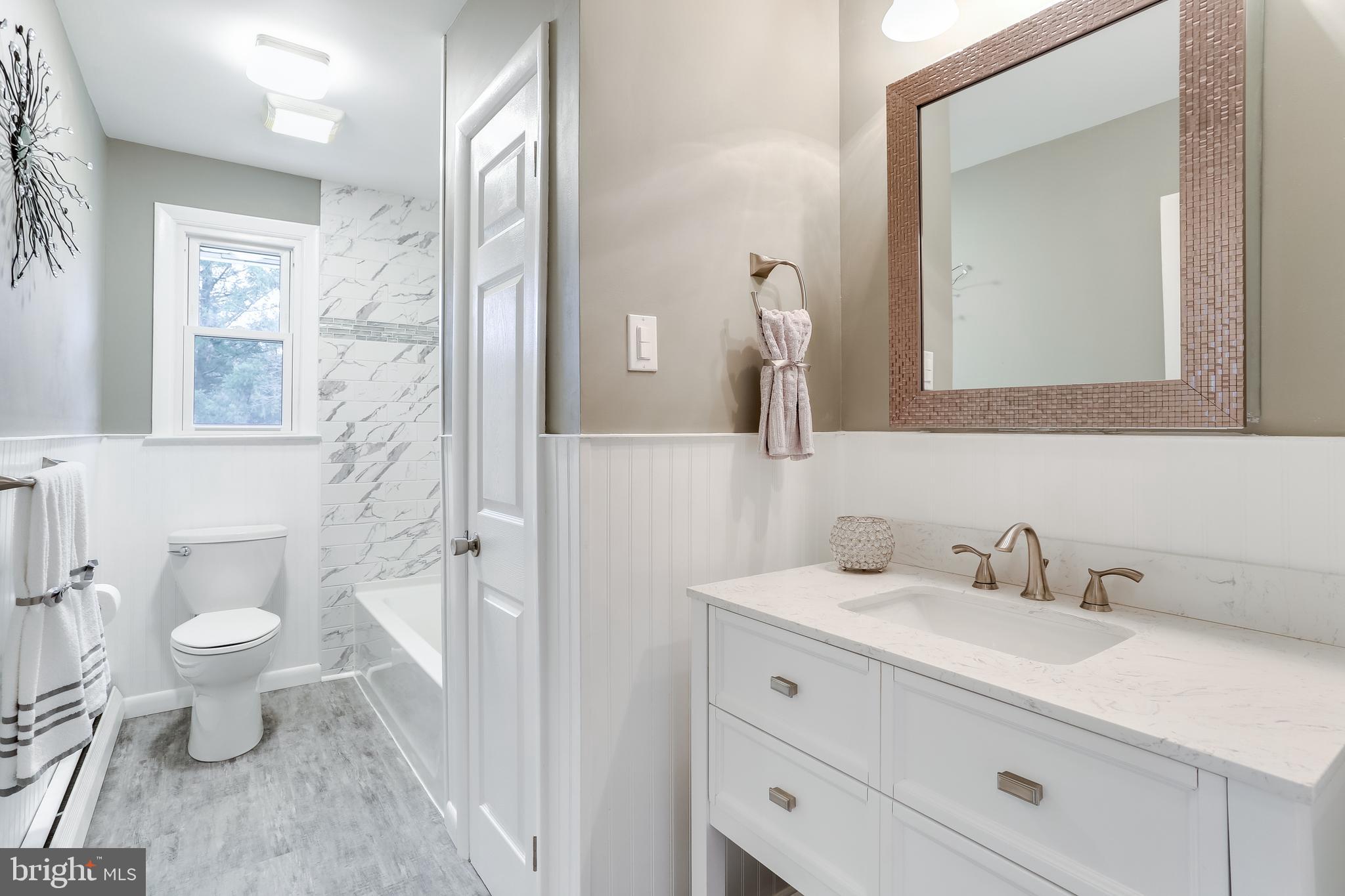 221 Coldbrook Road Lutherville-Timonium, MD 21093 - Photo 20 of 37 Hall Bath w/Vanity, Linnen Closet & Wainscotting.