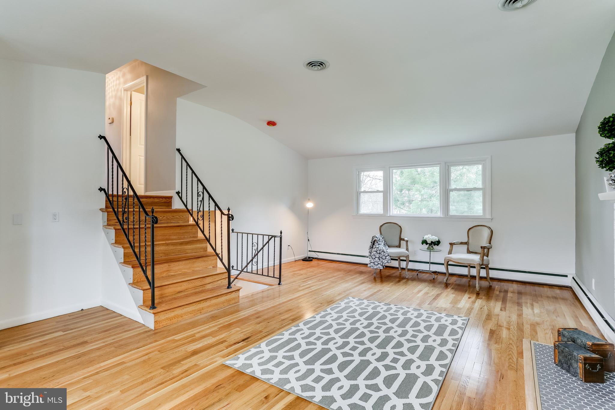 221 Coldbrook Road Lutherville-Timonium, MD 21093 - Photo 4 of 37 Gleaming Hardwood Floors & stairs