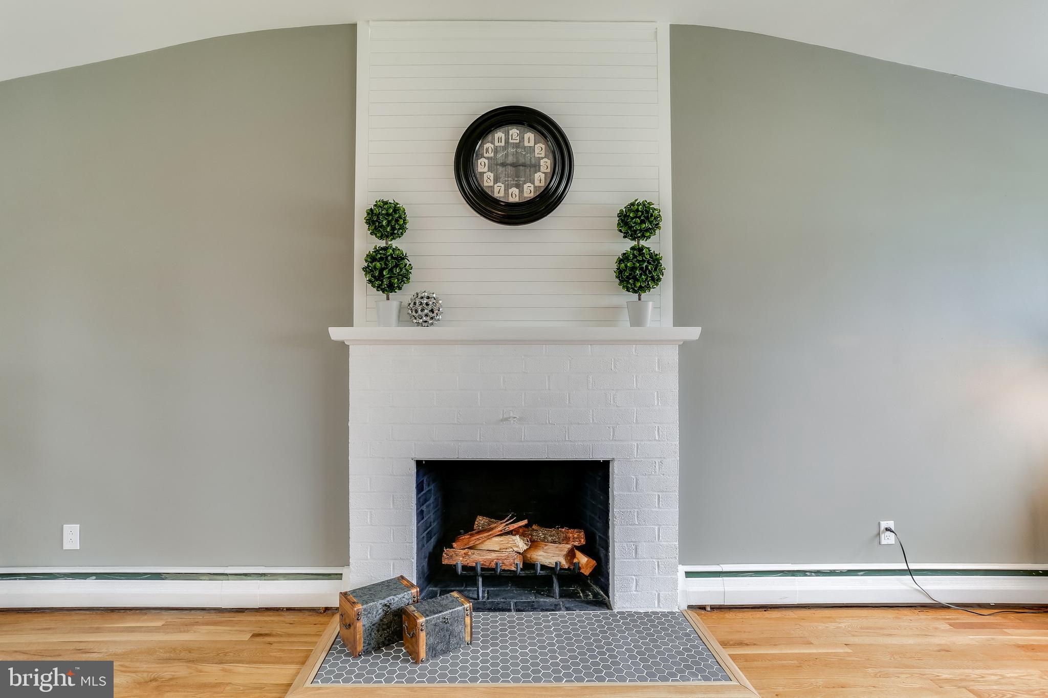 221 Coldbrook Road Lutherville-Timonium, MD 21093 - Photo 7 of 37 Wood Burning w/brick & shiplapped Fireplace