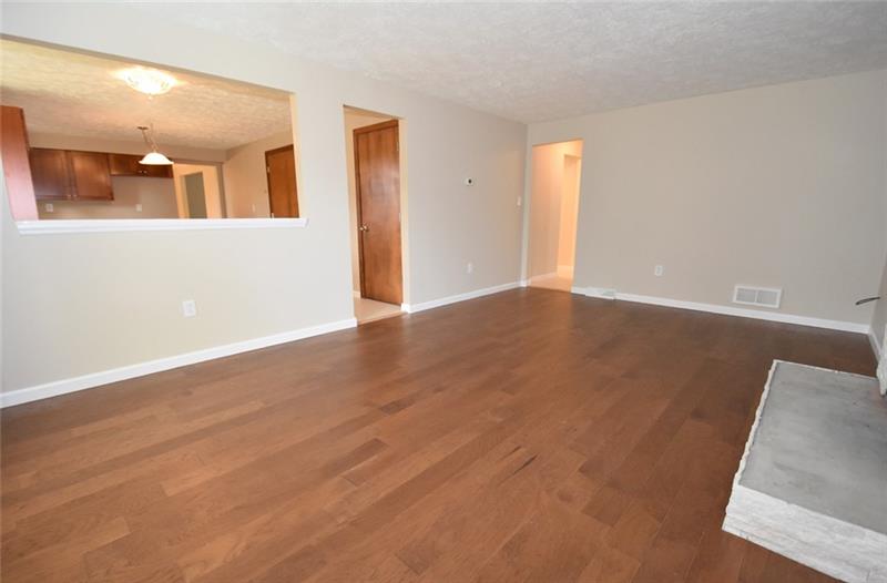 2405 Mill Grove Road Pittsburgh, PA 15241 - Photo 9 of 14 First floor family room..open an spacious! Come and see for our self! Renovated and updated! Make this home yours! You will not be disappointed!