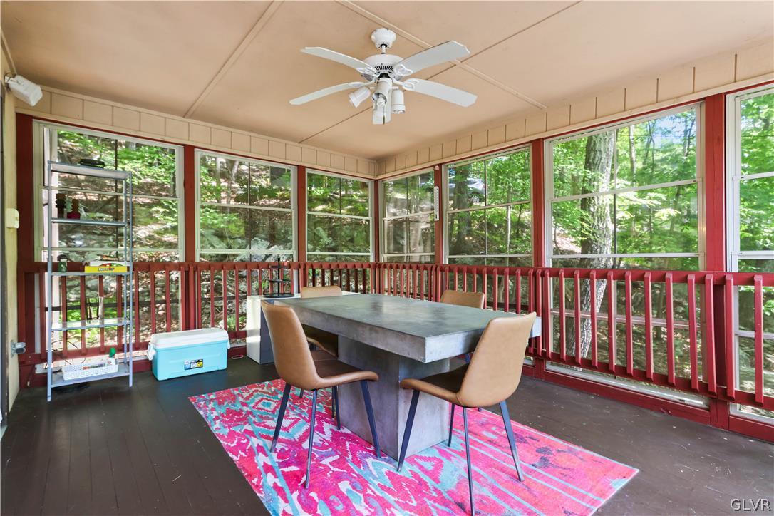 6463 Decker Road Bushkill, PA 18324 - Photo 17 of 50 a view of a dining room with furniture window and outside view