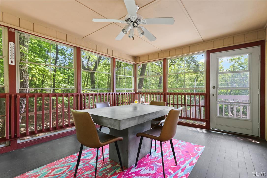 6463 Decker Road Bushkill, PA 18324 - Photo 18 of 50 a view of a dining room with furniture window and wooden floor