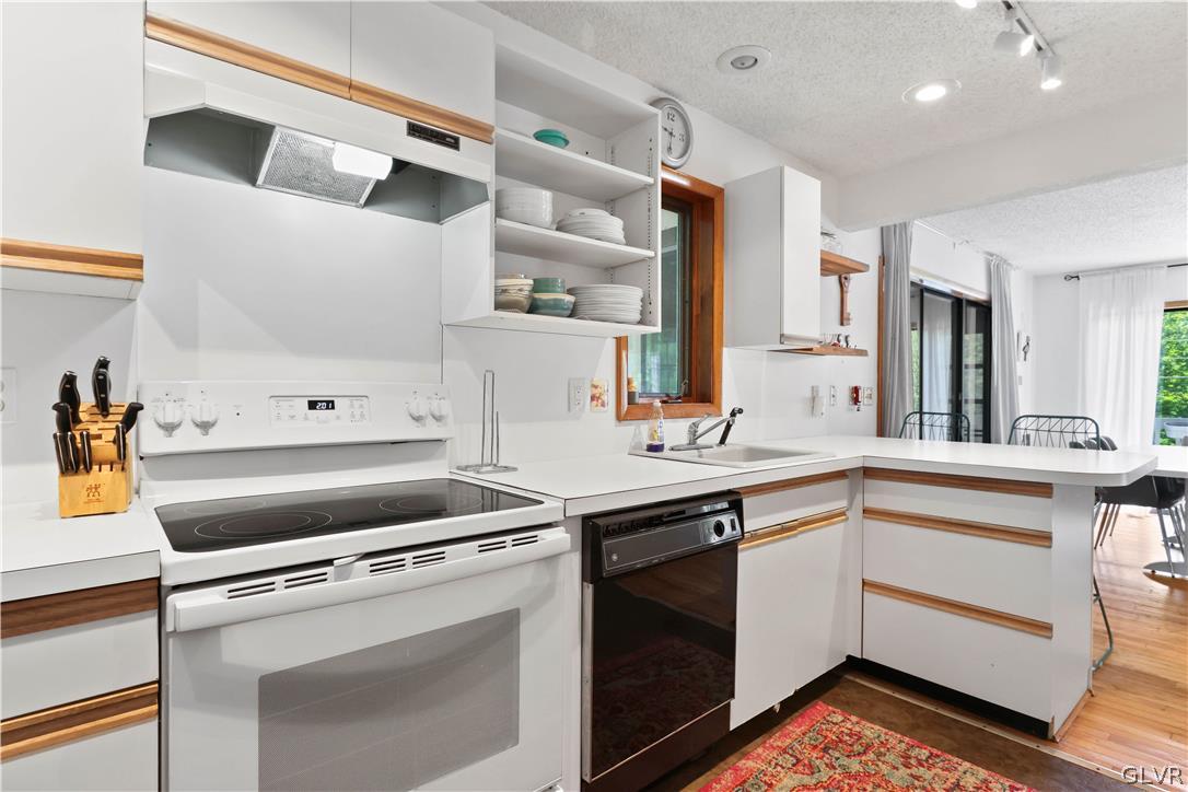 6463 Decker Road Bushkill, PA 18324 - Photo 23 of 50 a kitchen with cabinets appliances and a sink