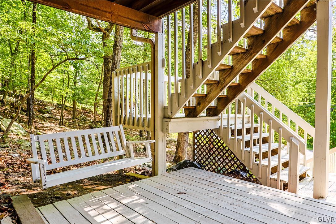 6463 Decker Road Bushkill, PA 18324 - Photo 3 of 50 a view of wooden balcony with wooden floor