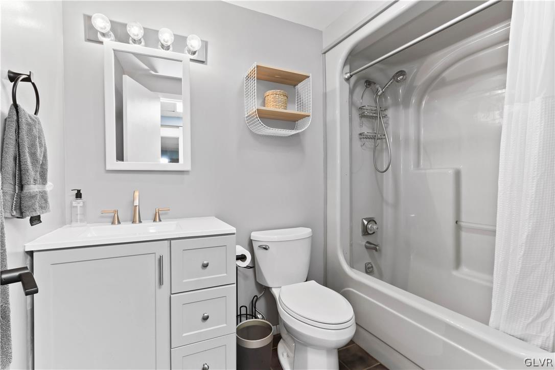 6463 Decker Road Bushkill, PA 18324 - Photo 33 of 50 a bathroom with a sink toilet and shower