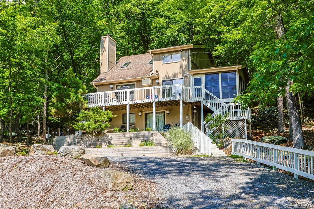 6463 Decker Road Bushkill, PA 18324 - Photo 42 of 50 a front view of a house with a yard