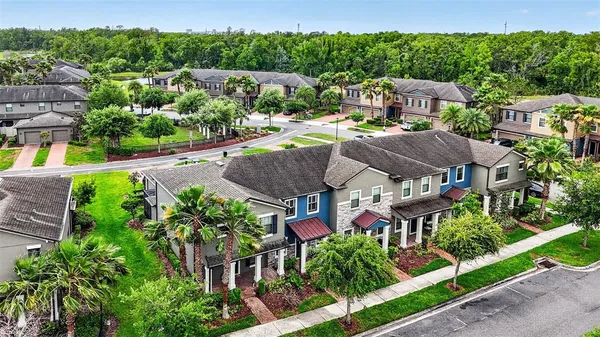 an aerial view of a house with a garden