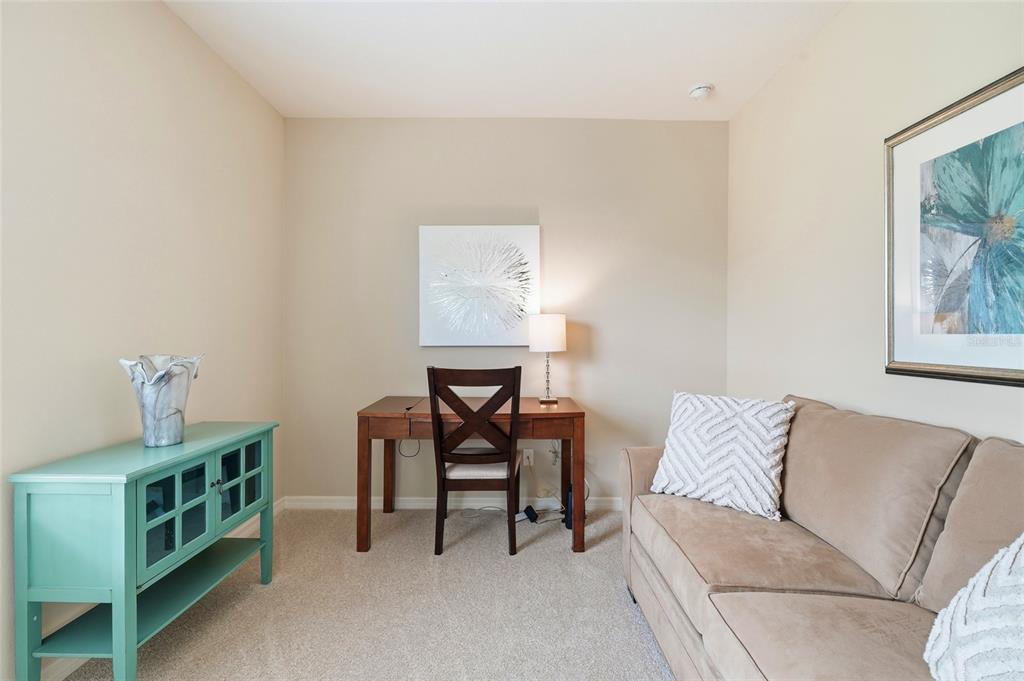 7321 Skybird Road, Unit 397 Bradenton, FL 34209 - Photo 16 of 35 a living room with furniture and a window