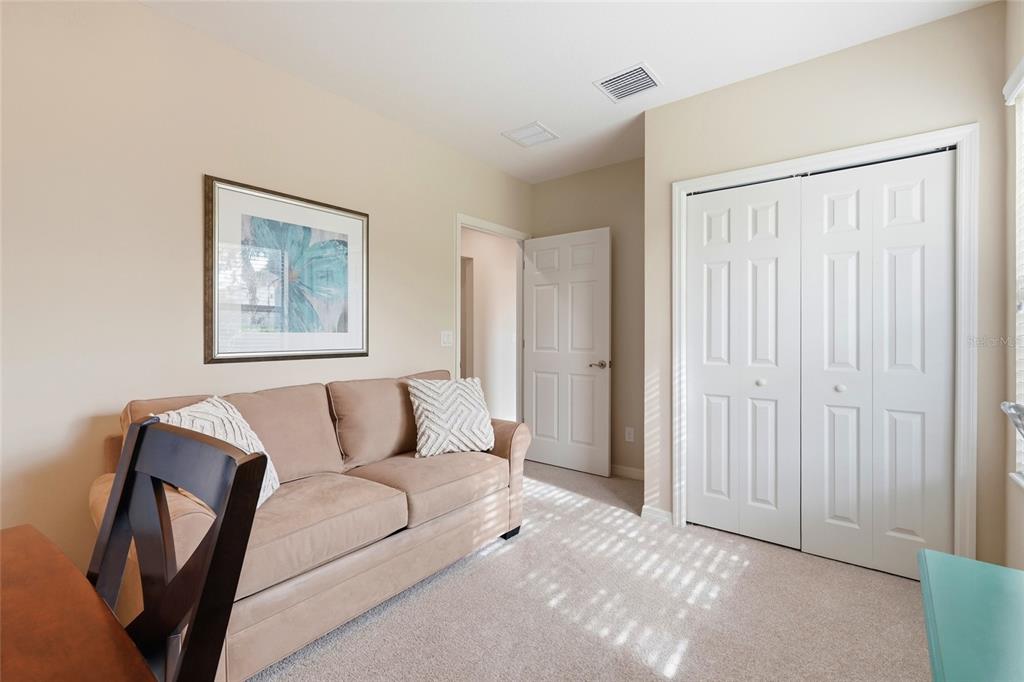 7321 Skybird Road, Unit 397 Bradenton, FL 34209 - Photo 17 of 35 a living room with furniture and a painting