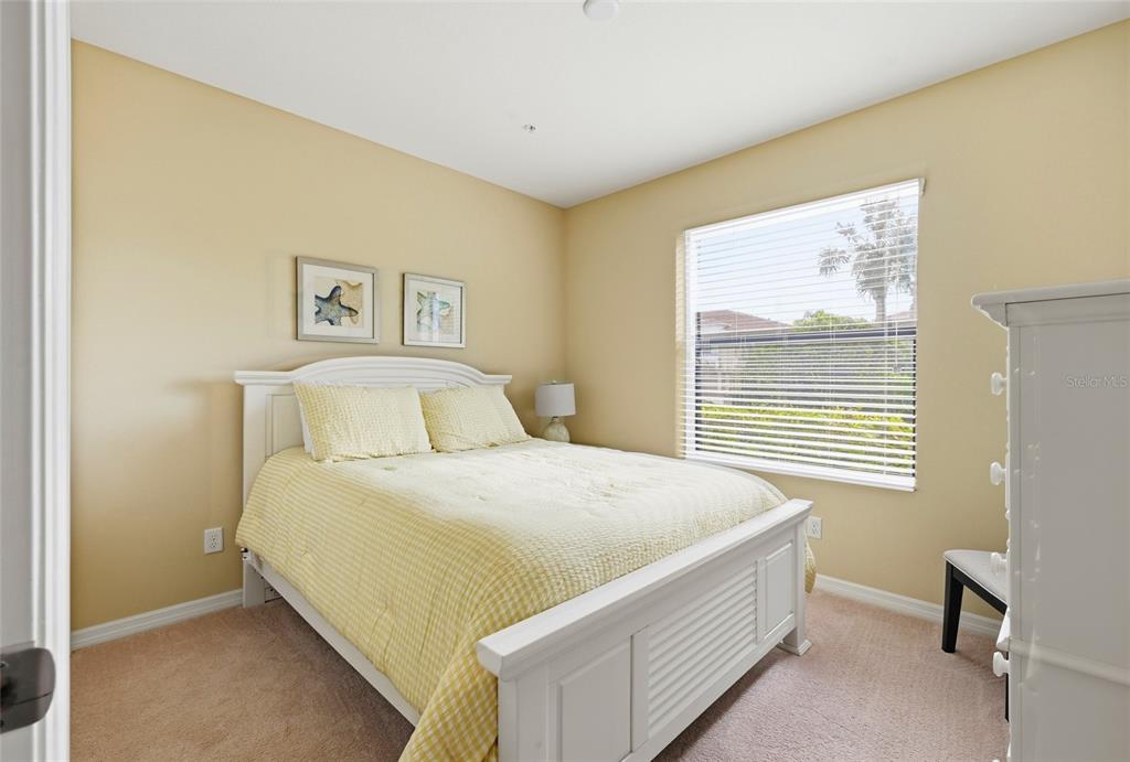 7321 Skybird Road, Unit 397 Bradenton, FL 34209 - Photo 18 of 35 a bedroom with a bed and a window