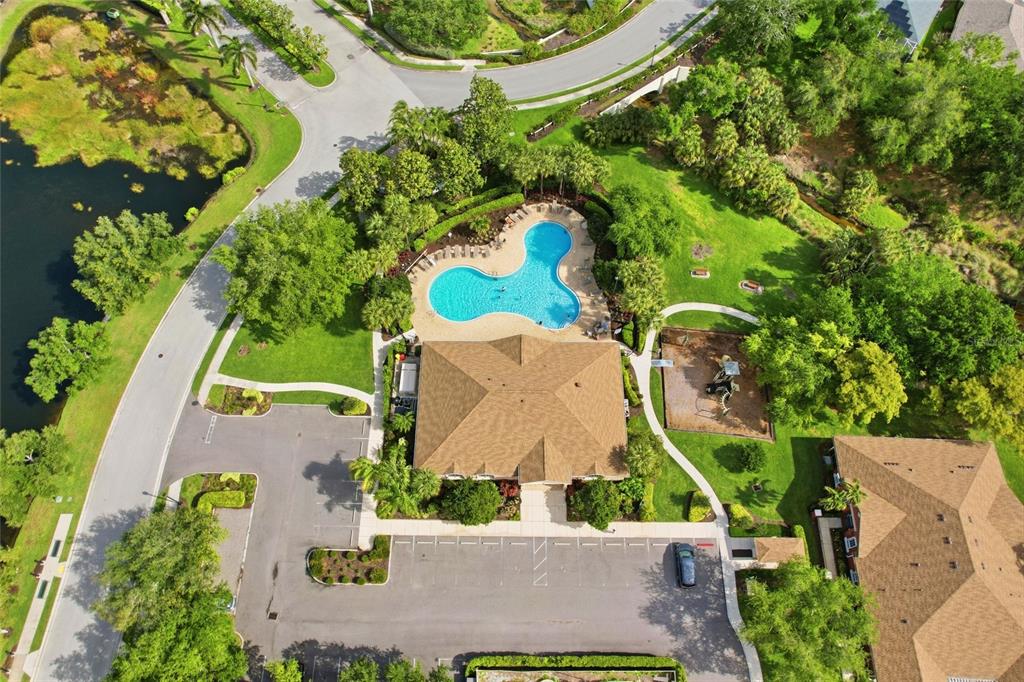 7321 Skybird Road, Unit 397 Bradenton, FL 34209 - Photo 30 of 35 an aerial view of a house with a garden and swimming pool