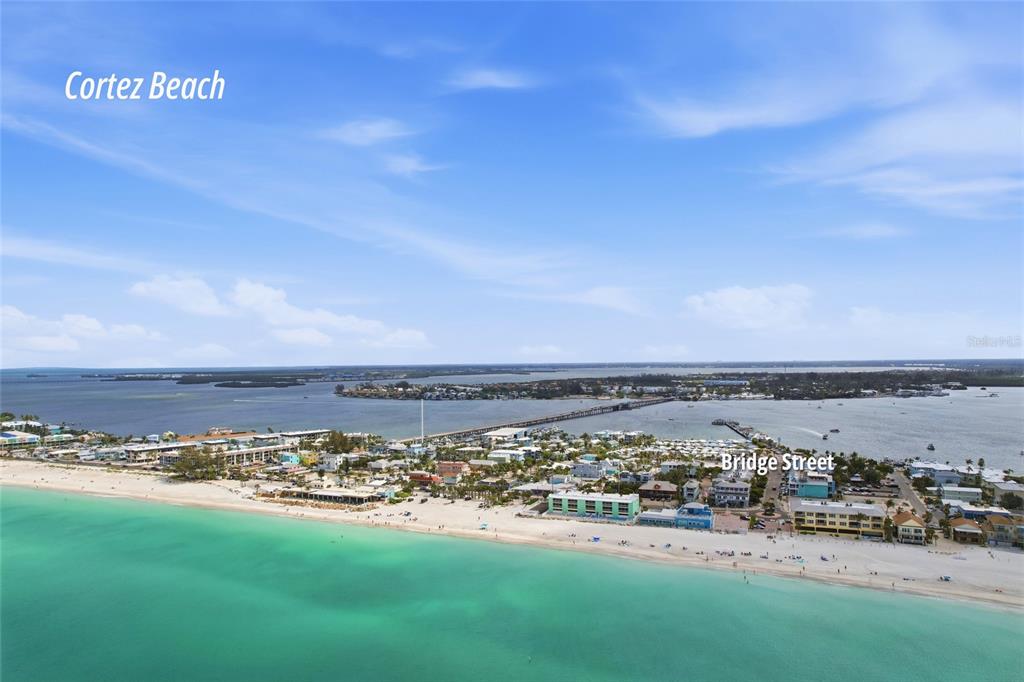 7321 Skybird Road, Unit 397 Bradenton, FL 34209 - Photo 32 of 35 a view of a large body of water with a building in the background