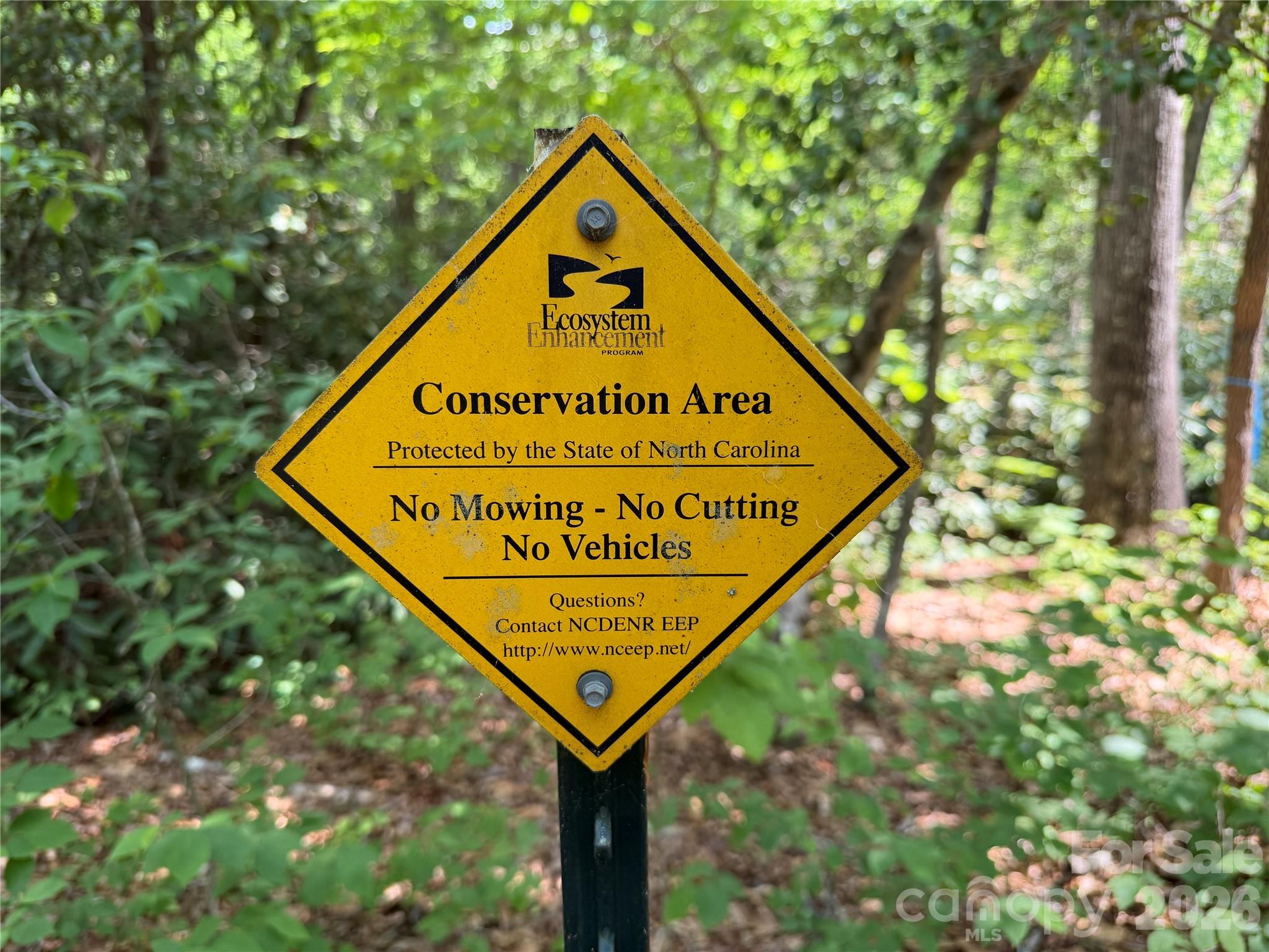180 Fat Wall Road Marion, NC 28752 - Photo 27 of 32 a sign on the wooden wall