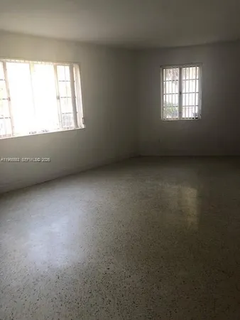 an empty room with a window