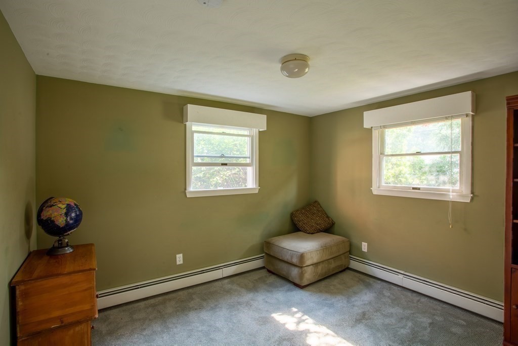 7 Temi Road Beverly, MA 01915 - Photo 15 of 40 a living room with furniture and a window