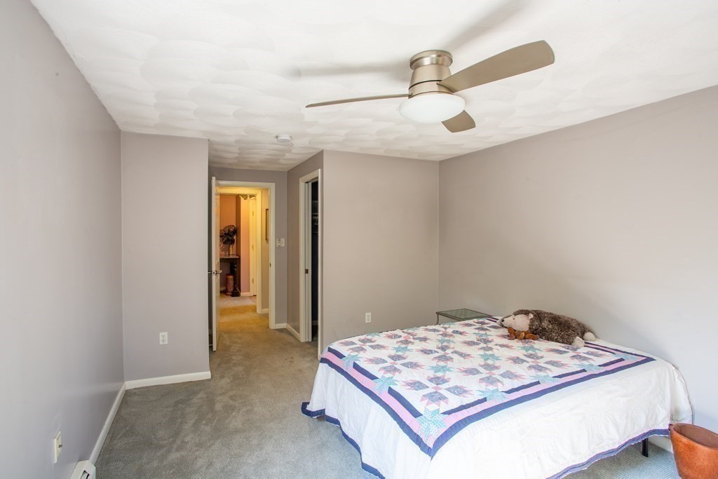7 Temi Road Beverly, MA 01915 - Photo 17 of 40 a bedroom with a bed and a dresser