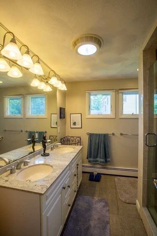 7 Temi Road Beverly, MA 01915 - Photo 25 of 40 a bathroom with a sink and a mirror