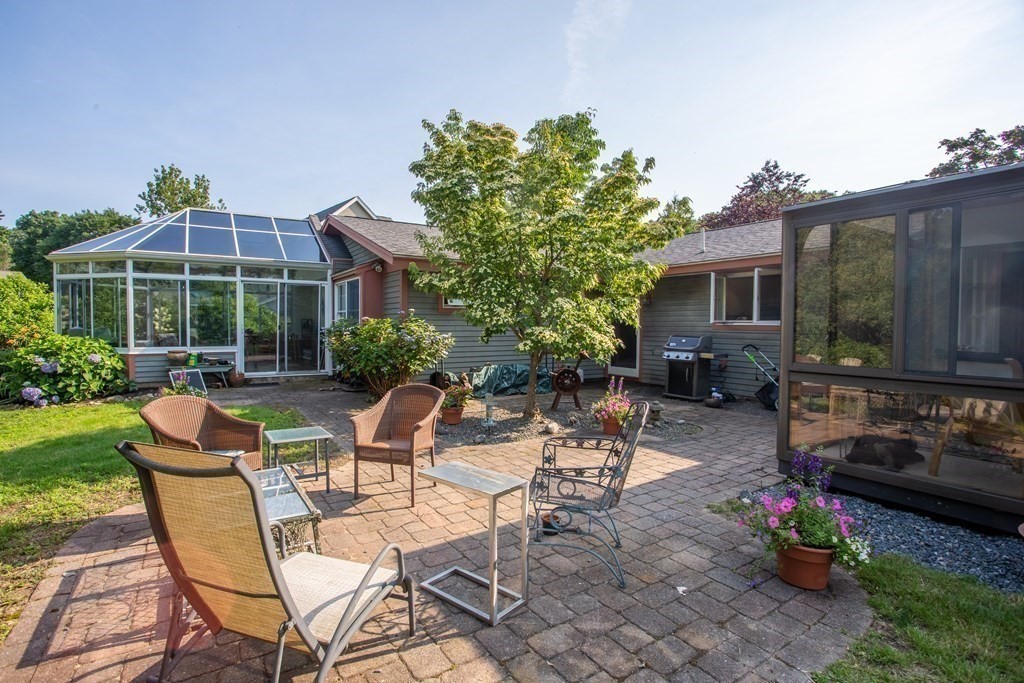 7 Temi Road Beverly, MA 01915 - Photo 4 of 40 a view of a backyard with sitting area