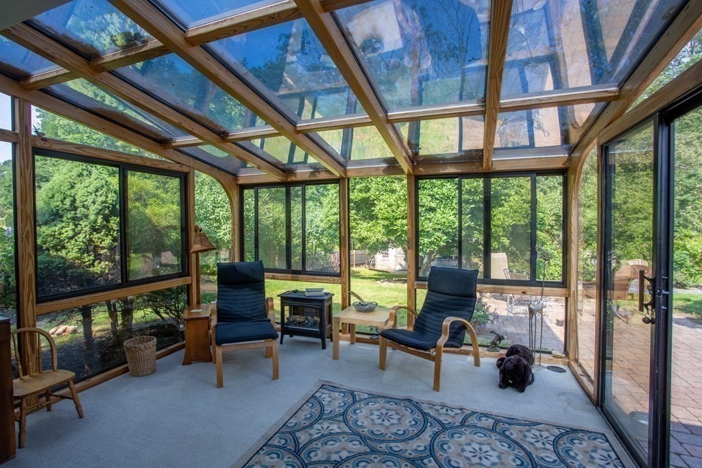 7 Temi Road Beverly, MA 01915 - Photo 8 of 40 a living room with furniture and a floor to ceiling window