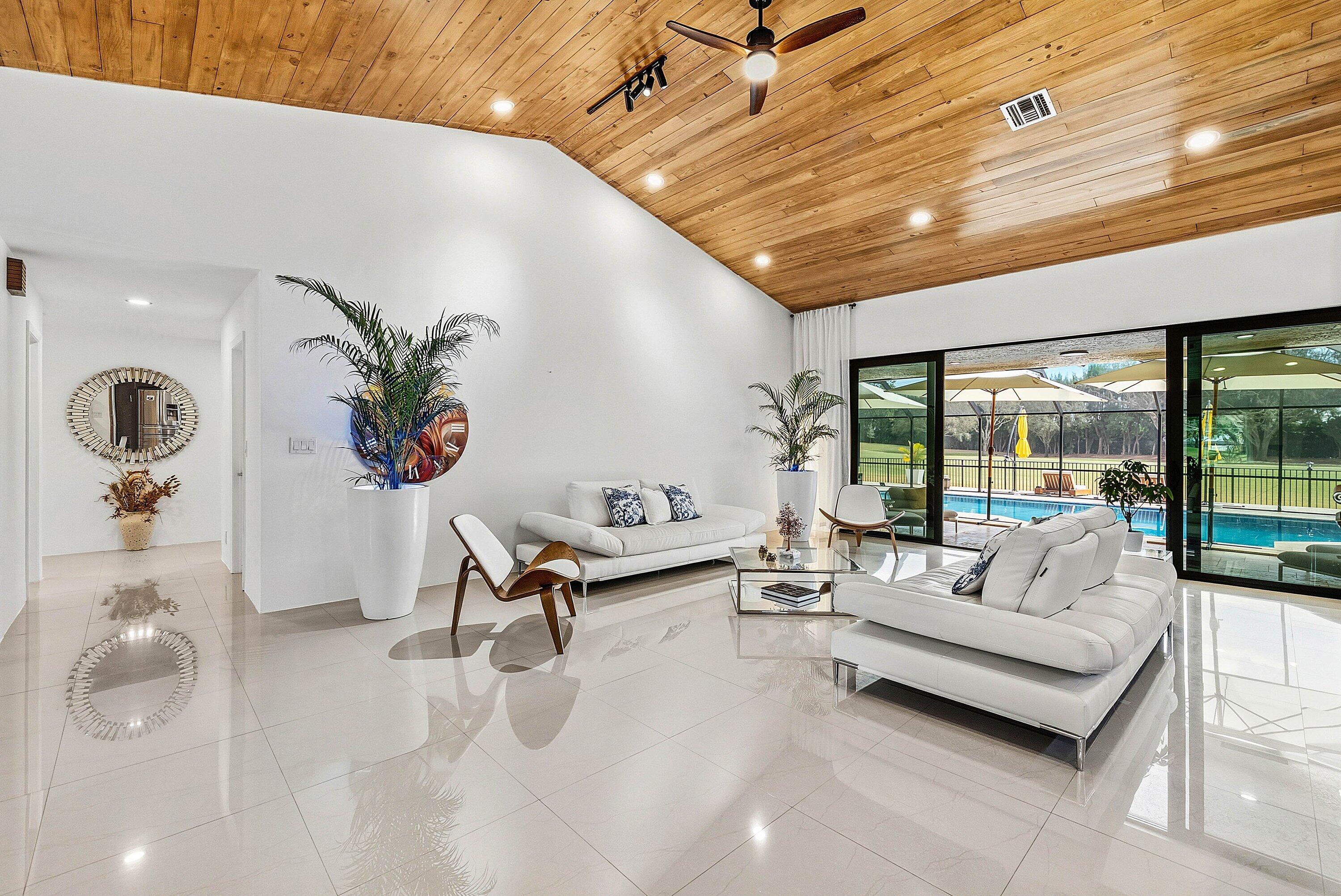 10710 Boca Woods Lane Boca Raton, FL 33428 - Photo 3 of 44 a living room with furniture