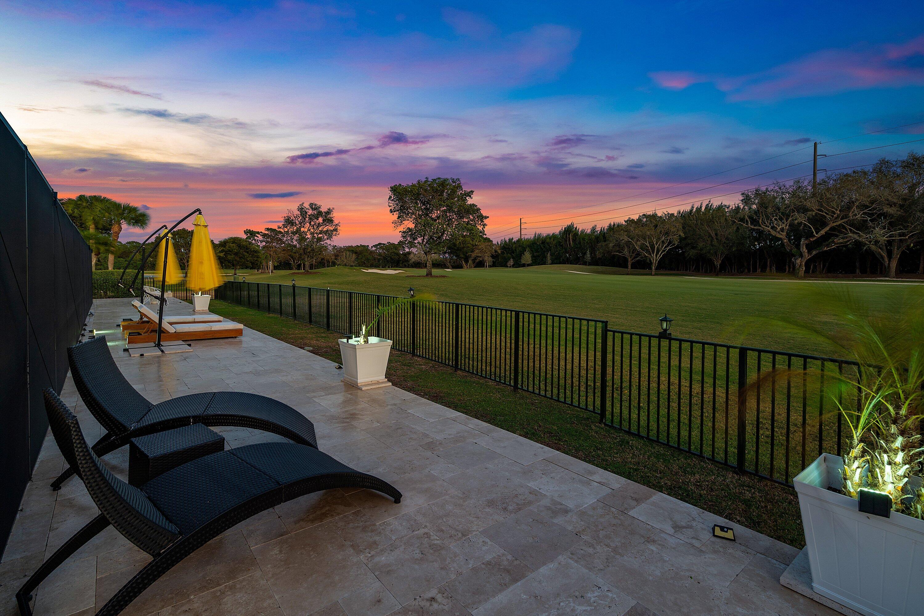 10710 Boca Woods Lane Boca Raton, FL 33428 - Photo 31 of 44 a view of a terrace with sitting area