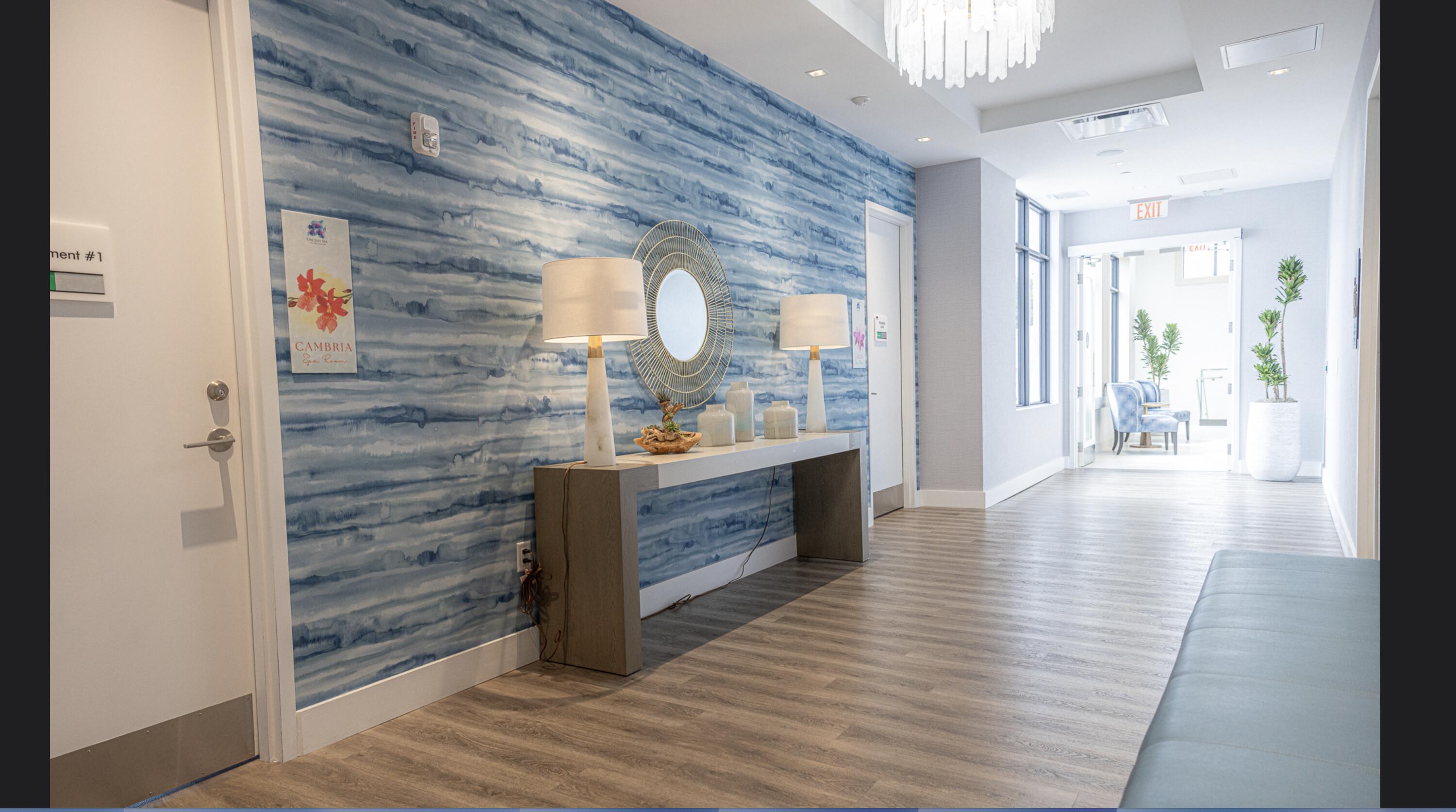 10710 Boca Woods Lane Boca Raton, FL 33428 - Photo 40 of 44 a bathroom with a wooden floor and a view of living room