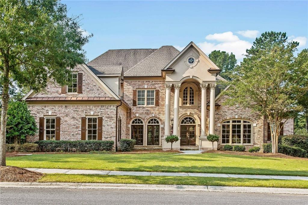 GOVERNORS TOWNE CLUB PRESENTS THIS SPECTACULAR BRICK HOME