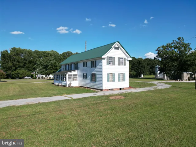 a wooden bench sitting on top of a wooden floor