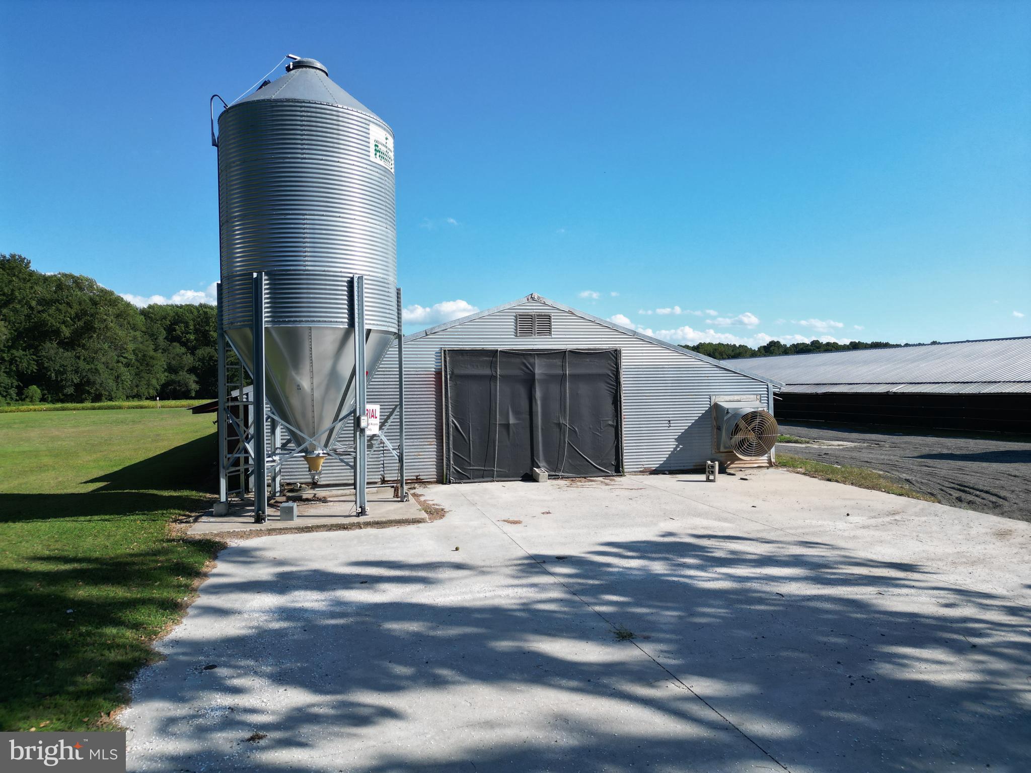 4070 Woodpecker Road Seaford, DE 19973 - Photo 9 of 14 a wooden bench sitting on top of a wooden floor