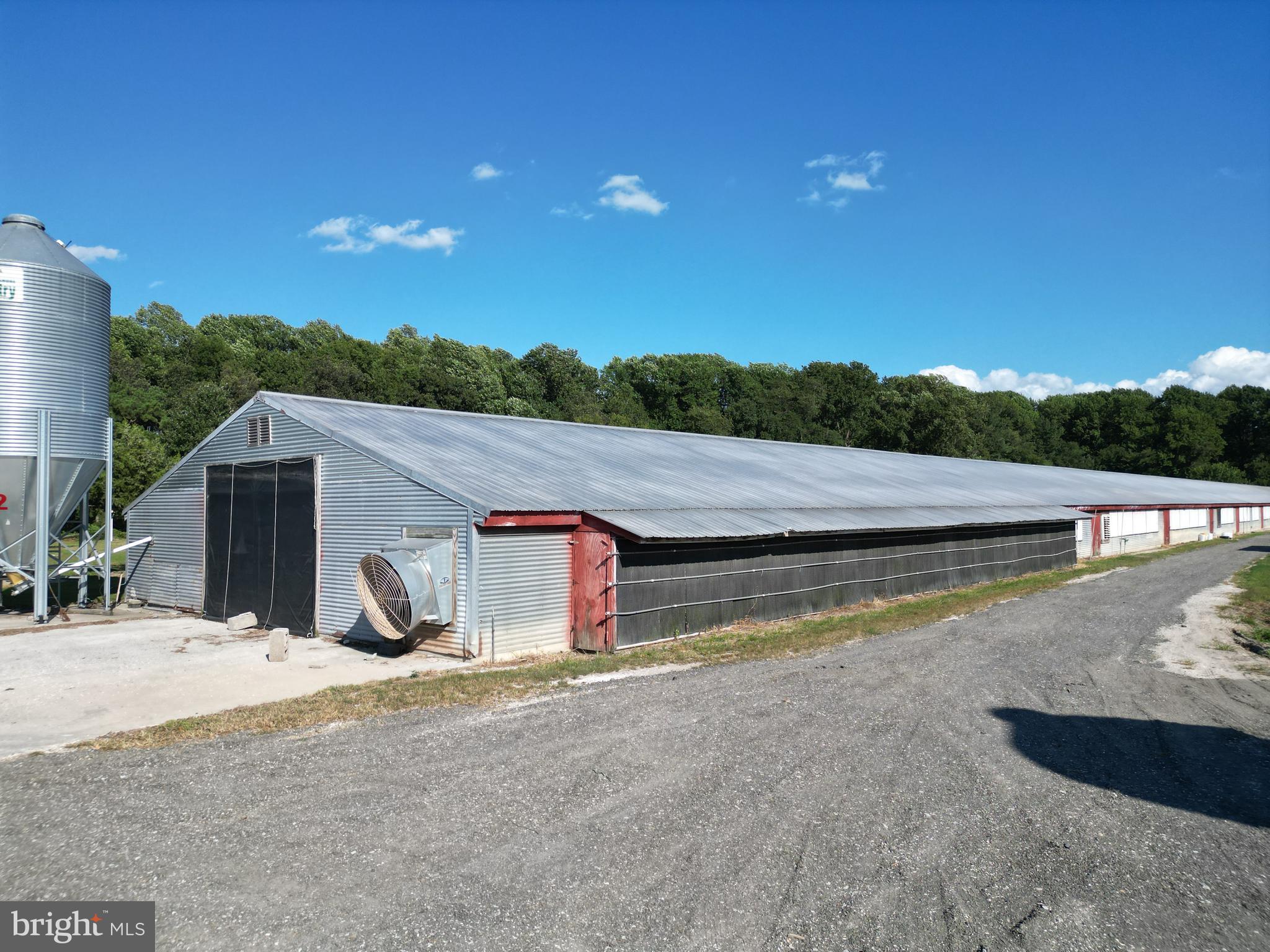 4070 Woodpecker Road Seaford, DE 19973 - Photo 10 of 14 a view of swimming pool with a yard and sitting area