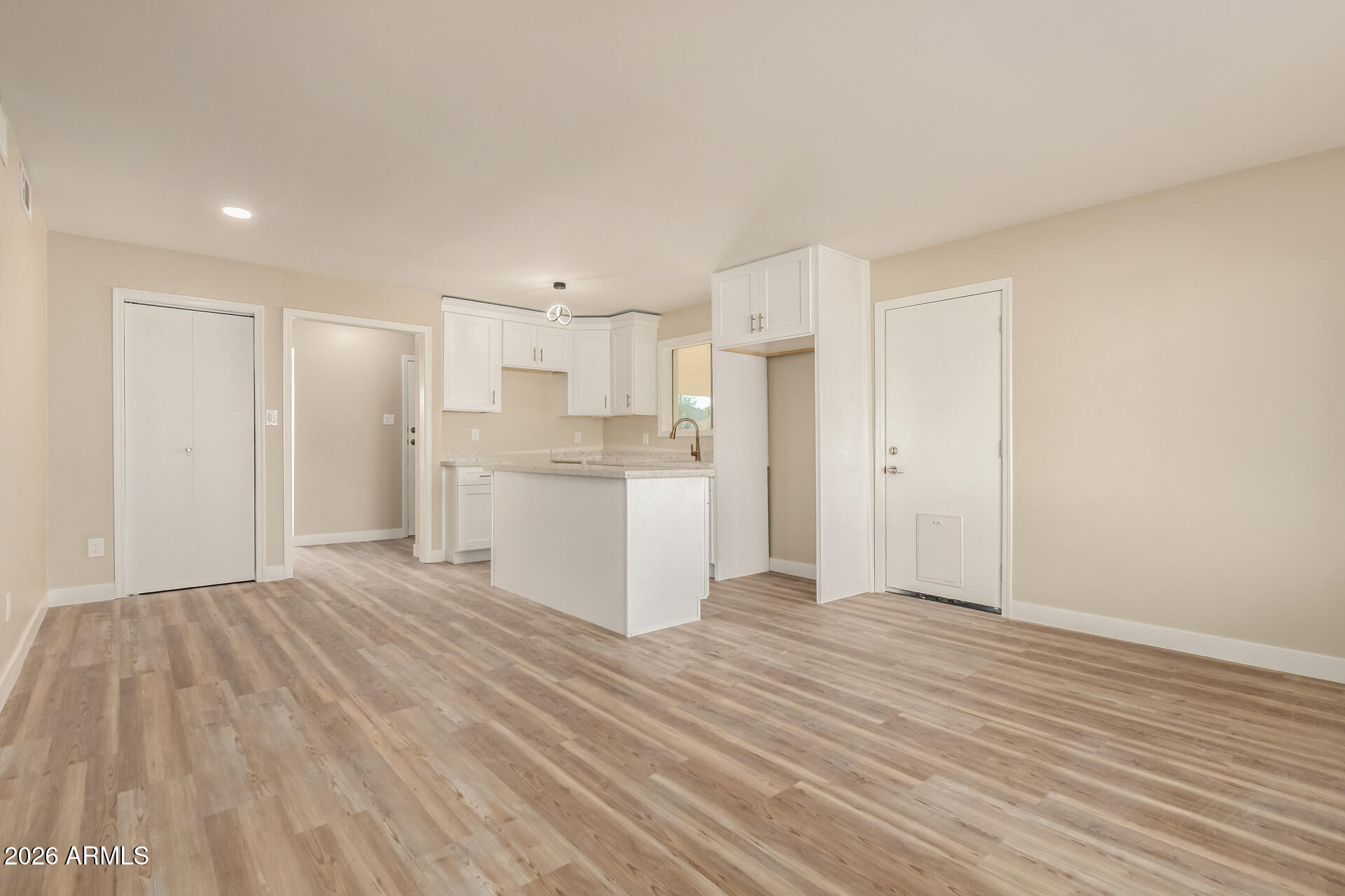 2834 East Shangri-La Road Phoenix, AZ 85028 - Photo 11 of 33 a view of a kitchen with wooden floor
