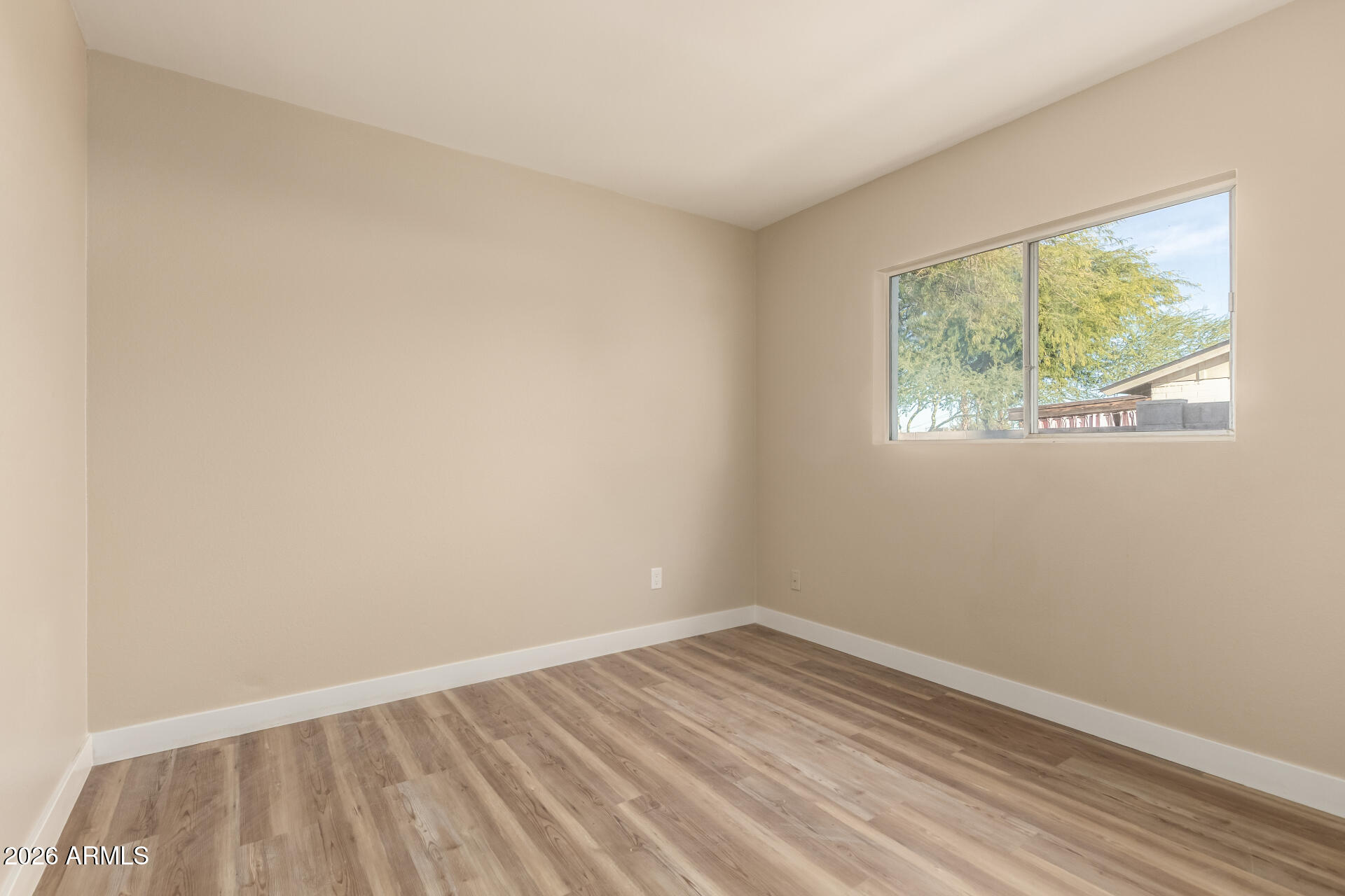 2834 East Shangri-La Road Phoenix, AZ 85028 - Photo 24 of 33 an empty room with a window