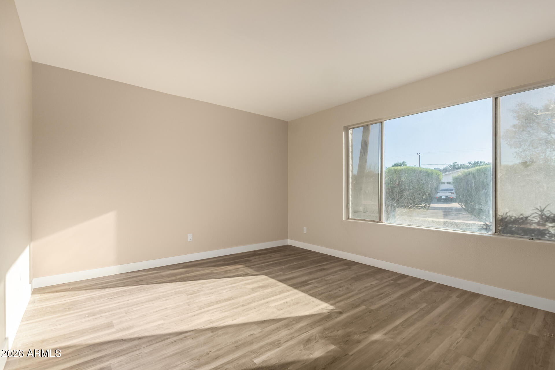2834 East Shangri-La Road Phoenix, AZ 85028 - Photo 5 of 33 a view of an empty room and window