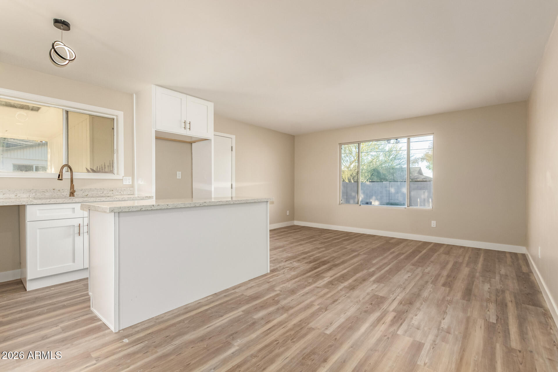 2834 East Shangri-La Road Phoenix, AZ 85028 - Photo 9 of 33 a view of kitchen with wooden floor and electronic appliances