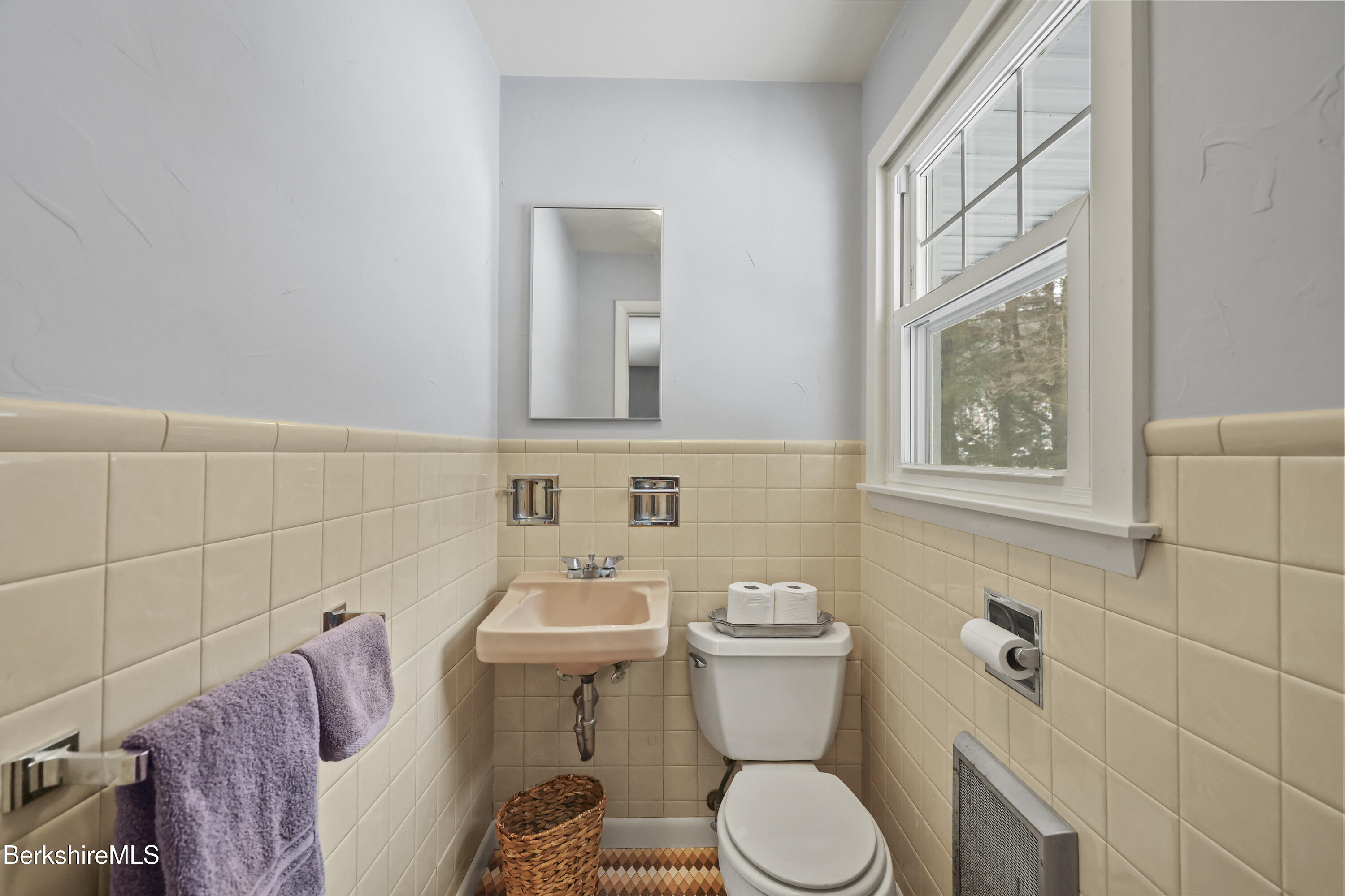 184 Washington Mountain Road Lee, MA 01238 - Photo 24 of 42 a white toilet sitting next to a bathroom sink