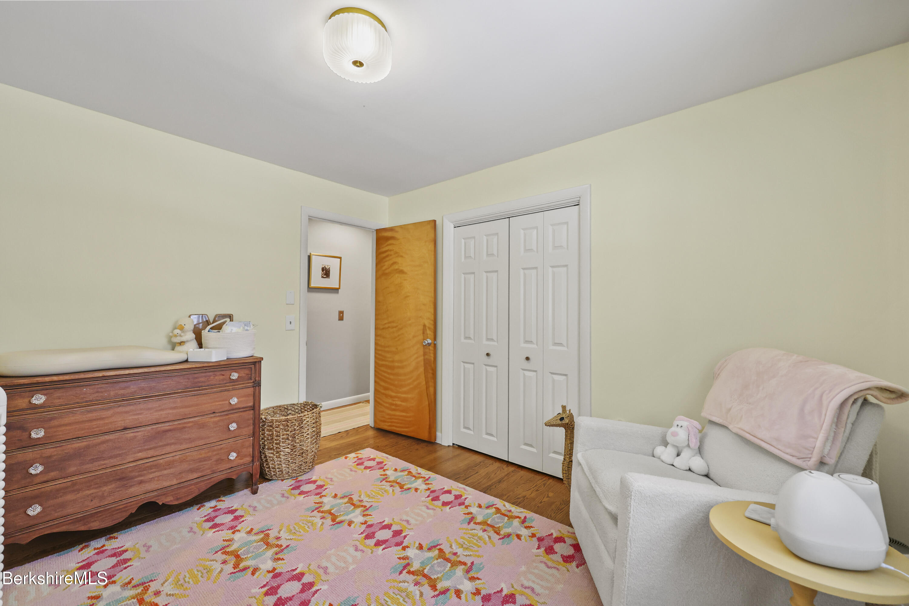 184 Washington Mountain Road Lee, MA 01238 - Photo 30 of 42 a bedroom with a bed and a couch