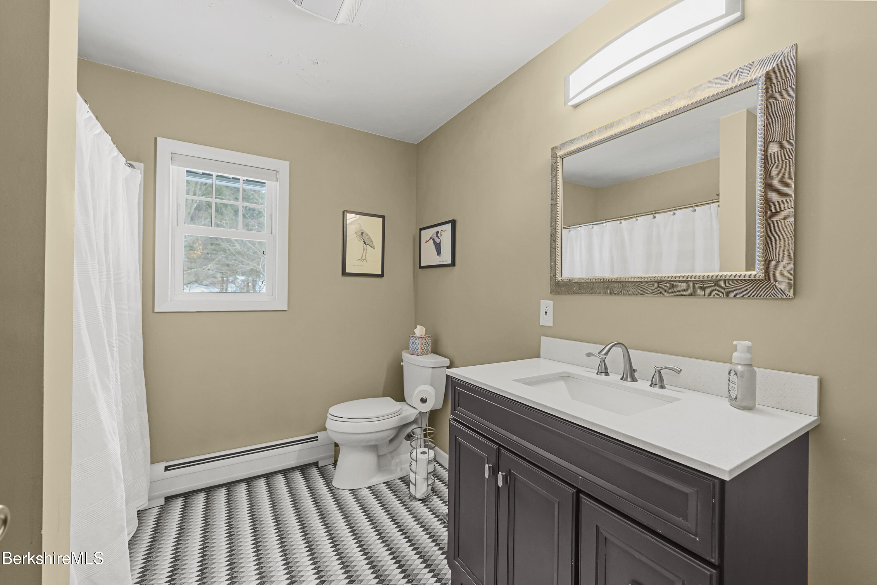 184 Washington Mountain Road Lee, MA 01238 - Photo 31 of 42 a bathroom with a sink and a mirror