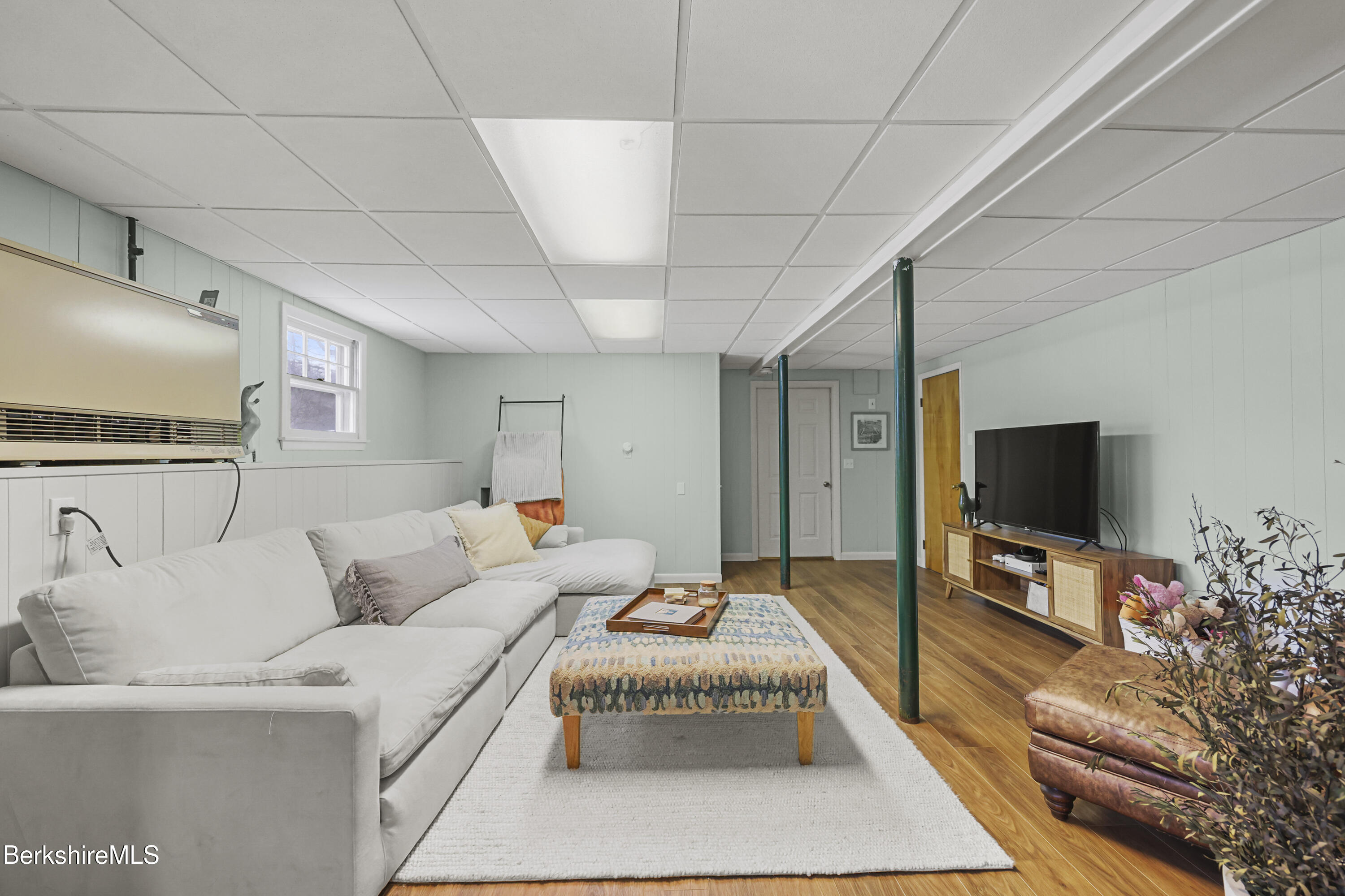 184 Washington Mountain Road Lee, MA 01238 - Photo 5 of 42 a living room with furniture and a flat screen tv