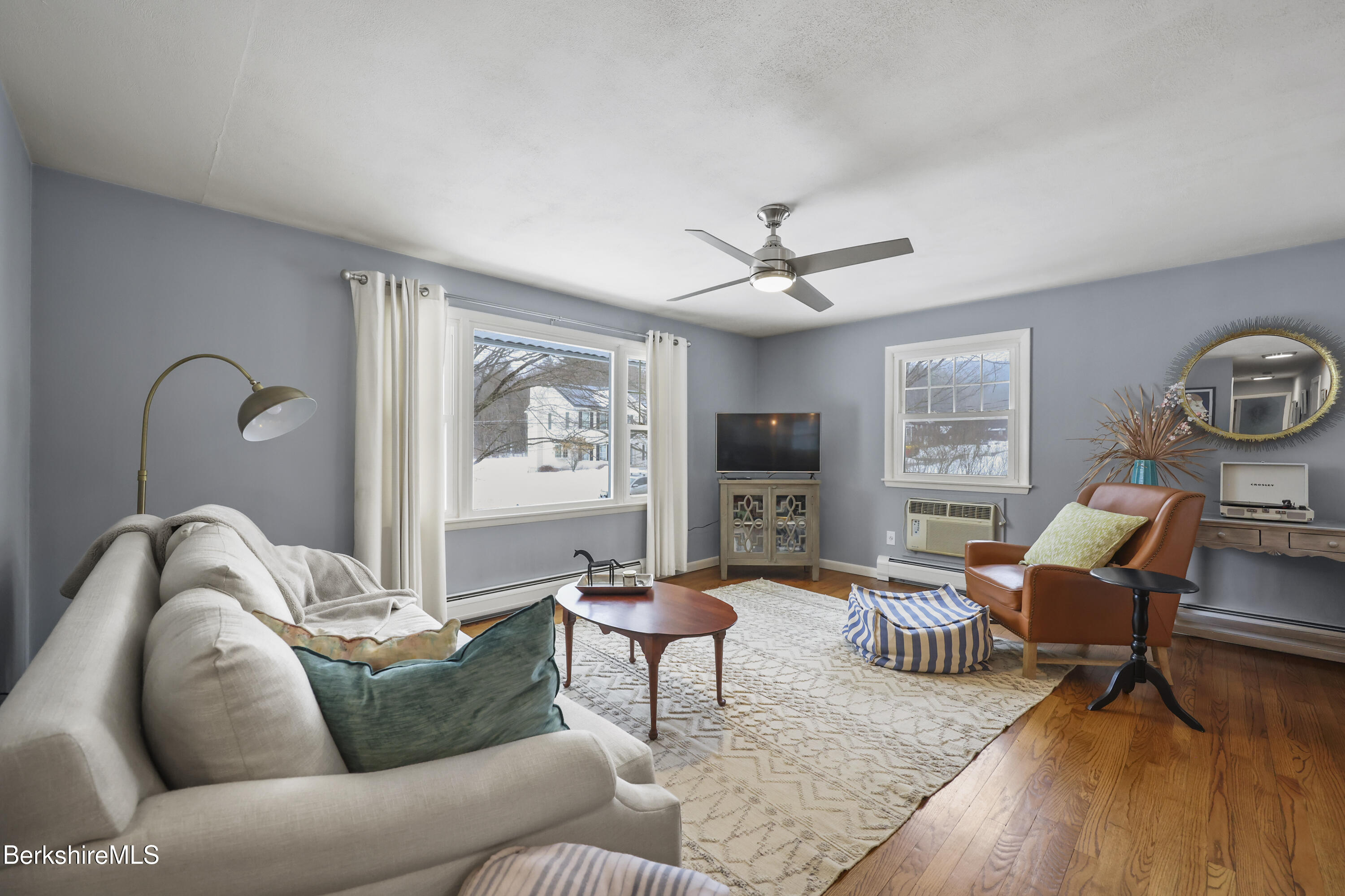 184 Washington Mountain Road Lee, MA 01238 - Photo 8 of 42 a living room with furniture and a window