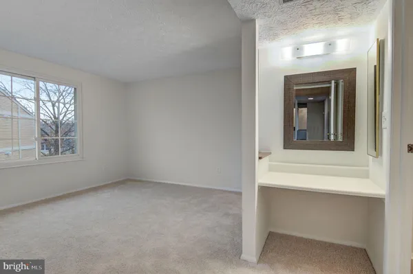 a view of an empty room with window