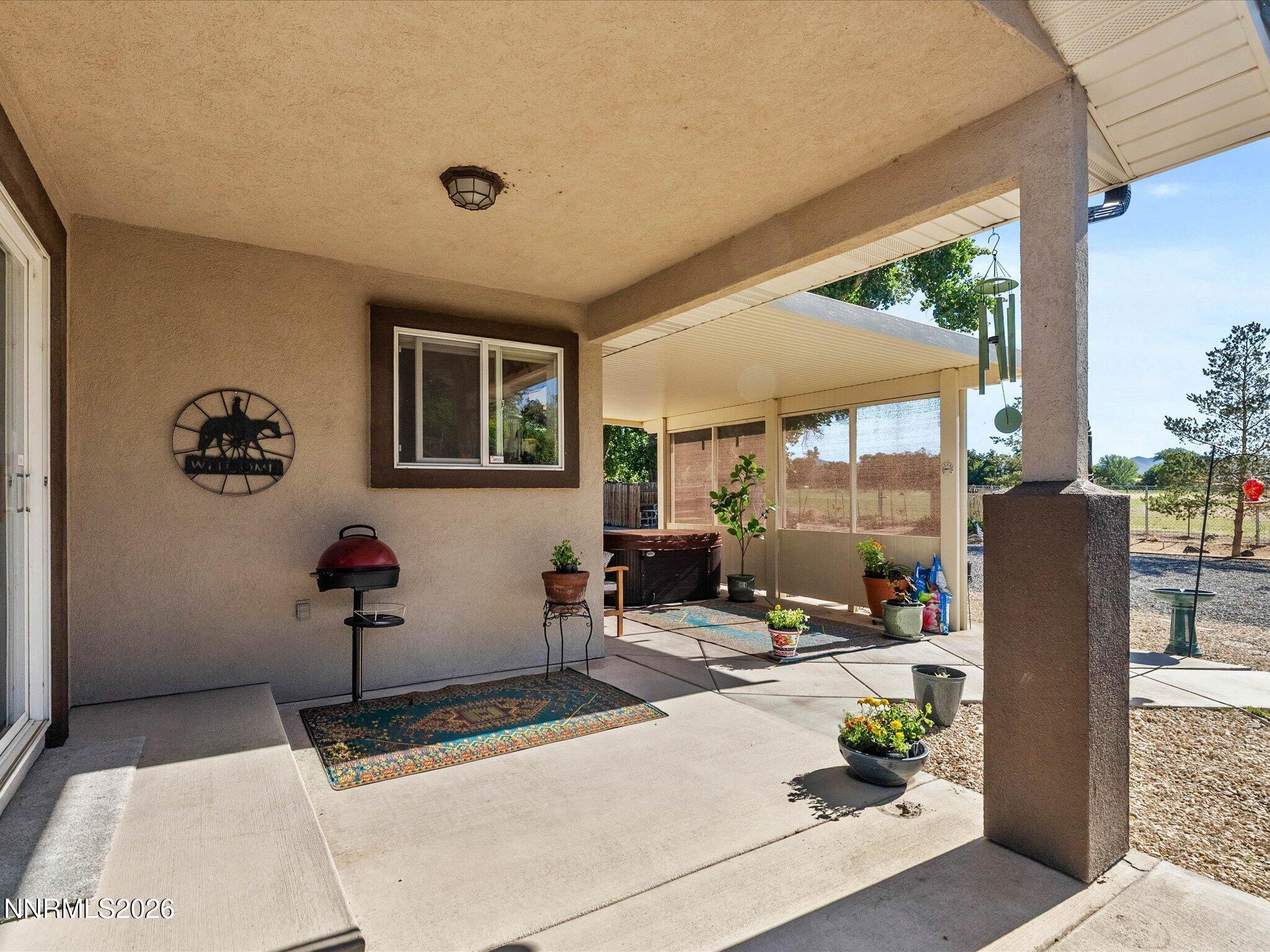 1080 Red Rock Road Fernley, NV 89408 - Photo 32 of 45 a room with gym equipment and a large window