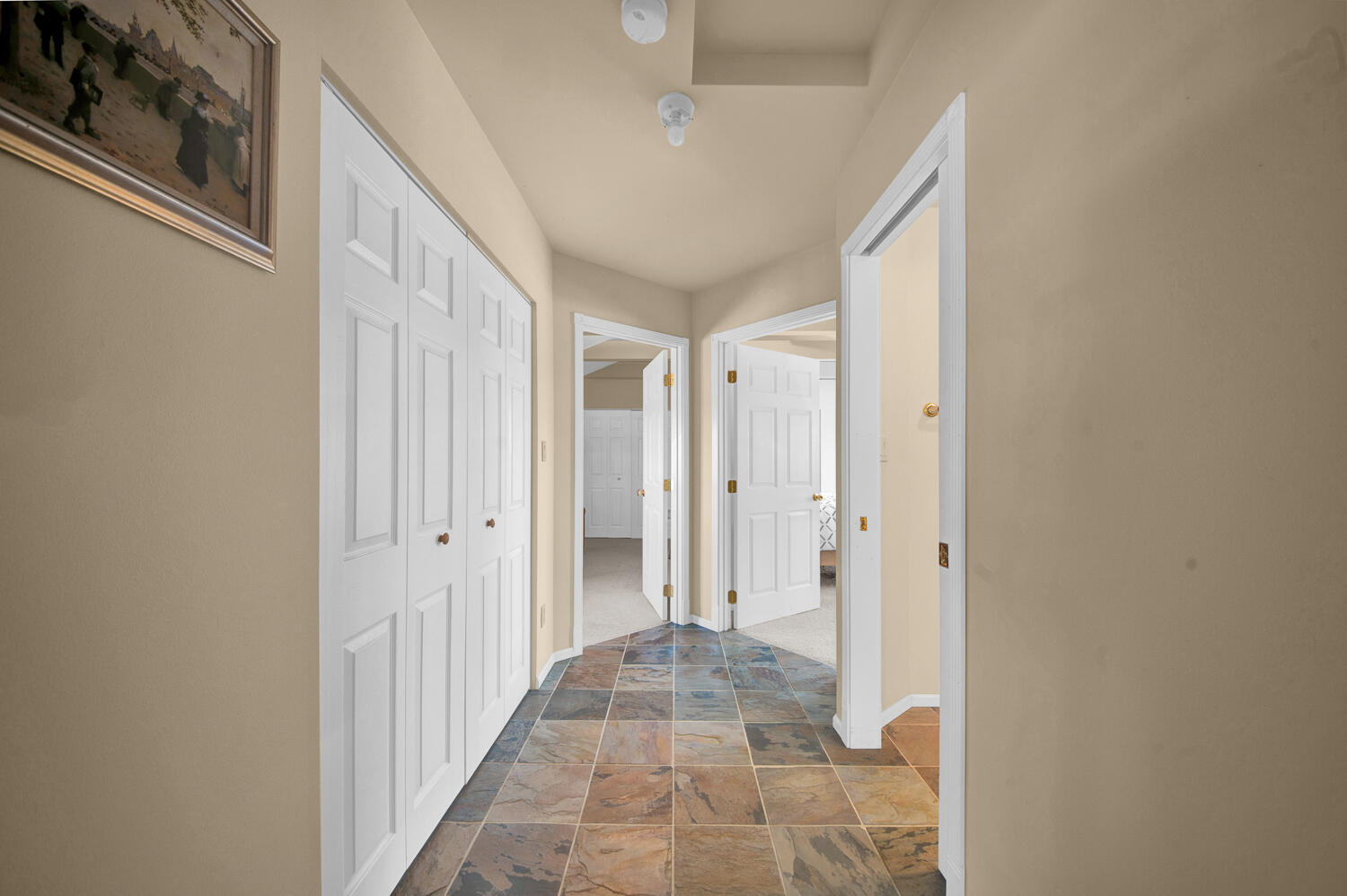 67100 Fryrear Road Bend, OR 97703 - Photo 34 of 38 a view of a hallway with a wooden door