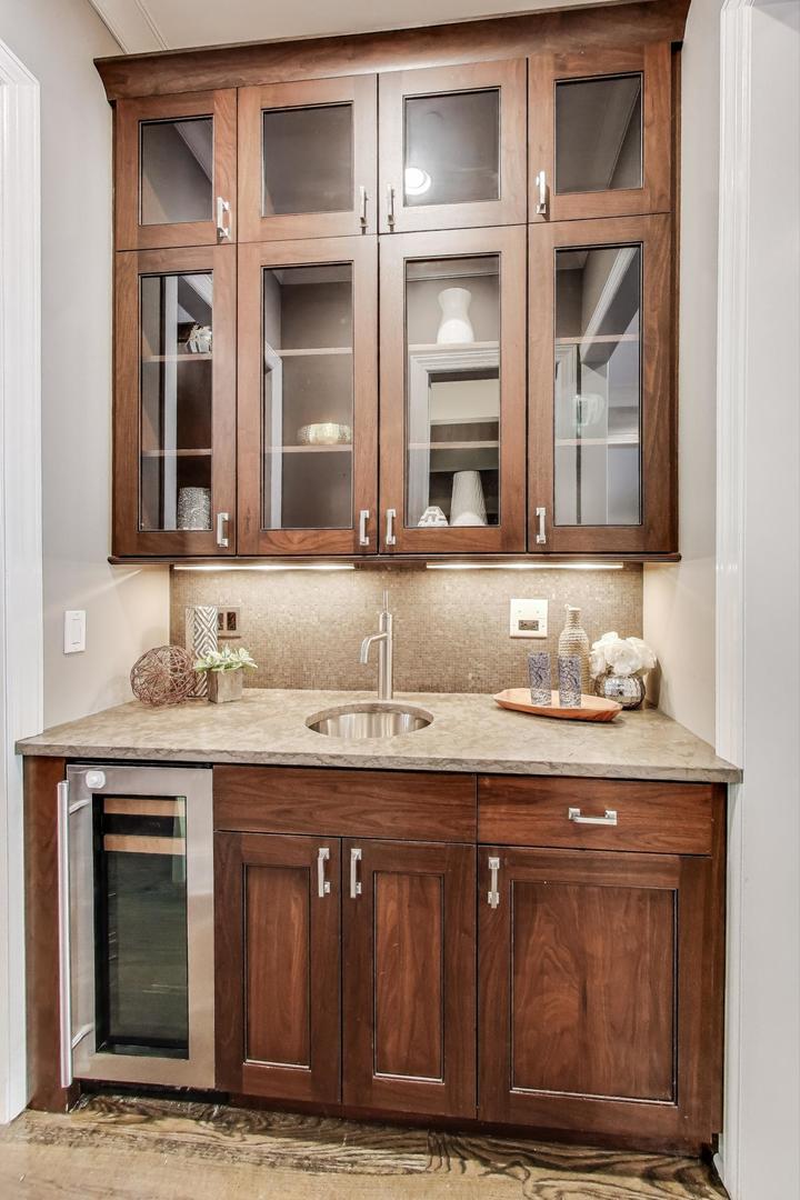 1758 West Surf Street Chicago, IL 60657 - Photo 12 of 51 a bathroom with a granite countertop sink and a mirror