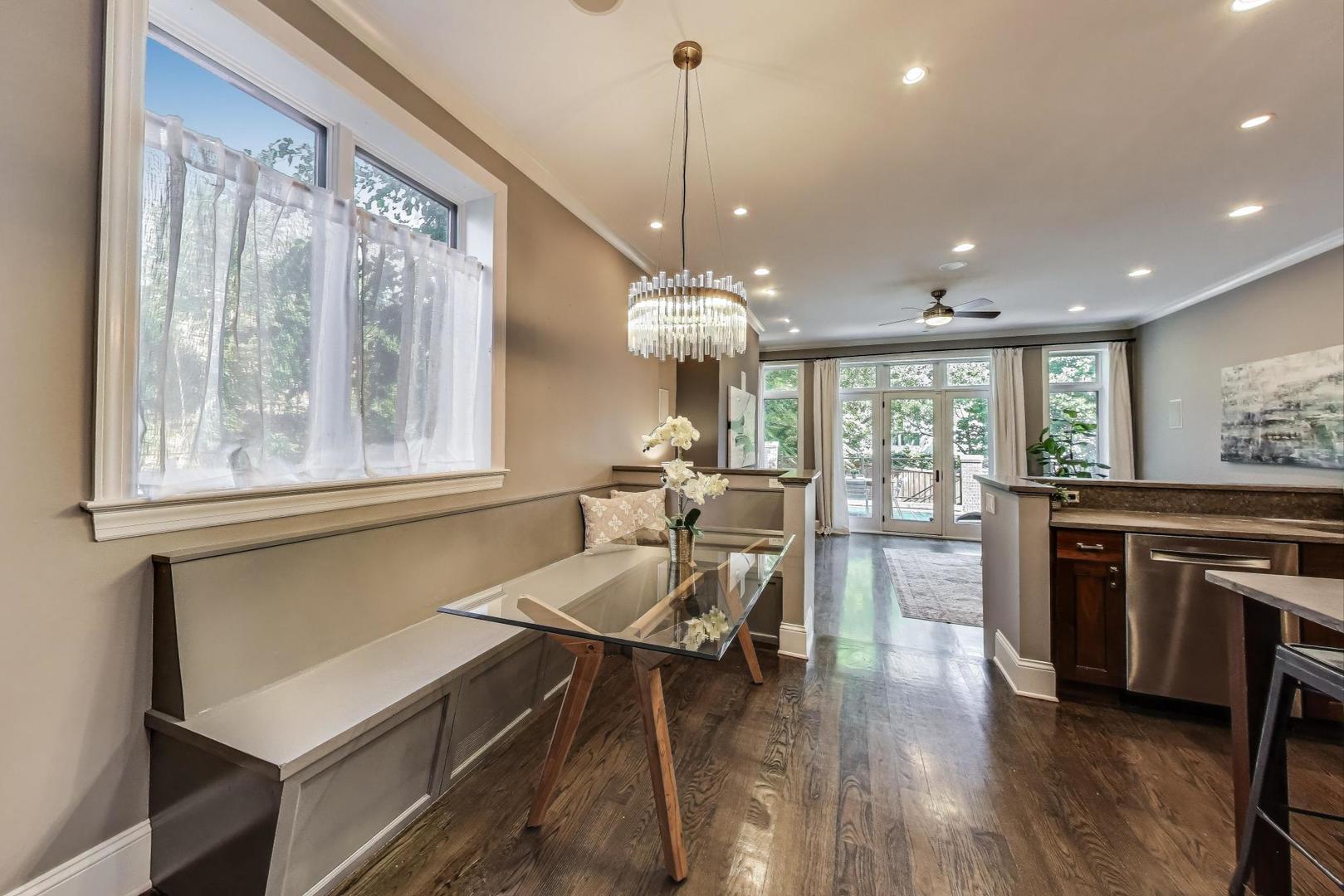 1758 West Surf Street Chicago, IL 60657 - Photo 14 of 51 a living room with furniture and a large window