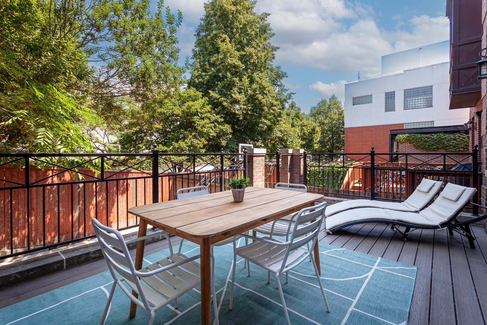 1758 West Surf Street Chicago, IL 60657 - Photo 19 of 51 a view of a chairs and table on the deck