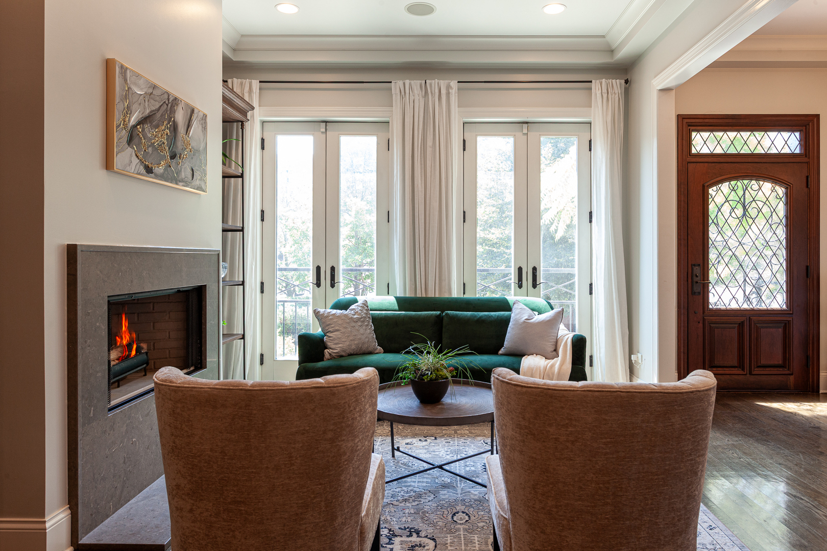 1758 West Surf Street Chicago, IL 60657 - Photo 2 of 51 a living room with furniture and a fireplace