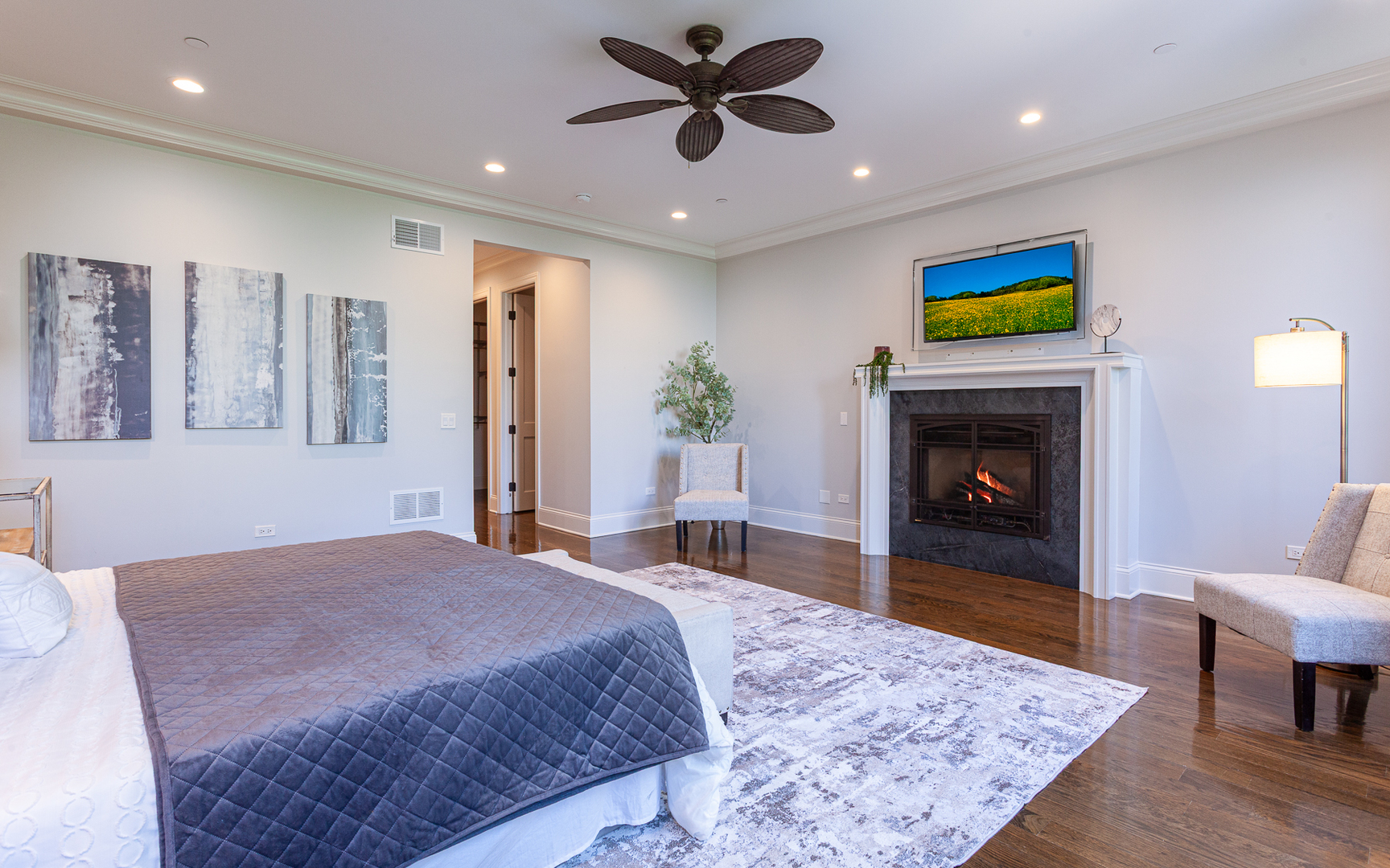 1758 West Surf Street Chicago, IL 60657 - Photo 23 of 51 a bed room with a bed and a fireplace