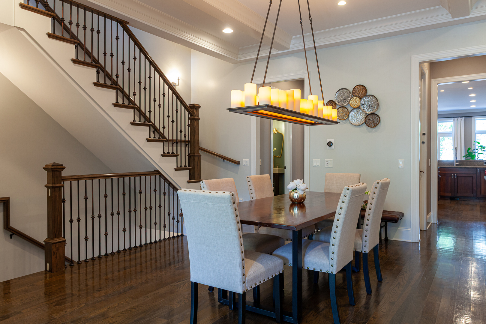 1758 West Surf Street Chicago, IL 60657 - Photo 7 of 51 a view of a dining room with furniture and wooden floor