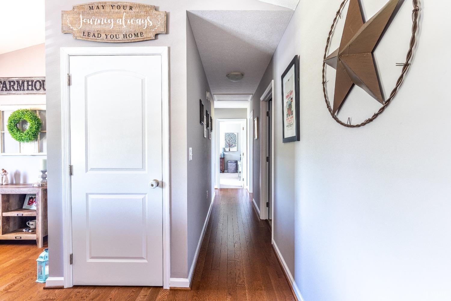 517 Beeks Lane Spout Spring, VA 24593 - Photo 8 of 33 a view of a hallway with wooden floor